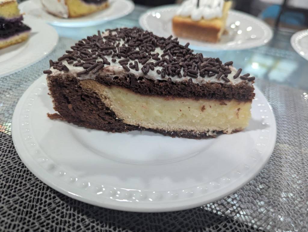 That One Place, LLC | Cheesecake inside of Chocolate Cake